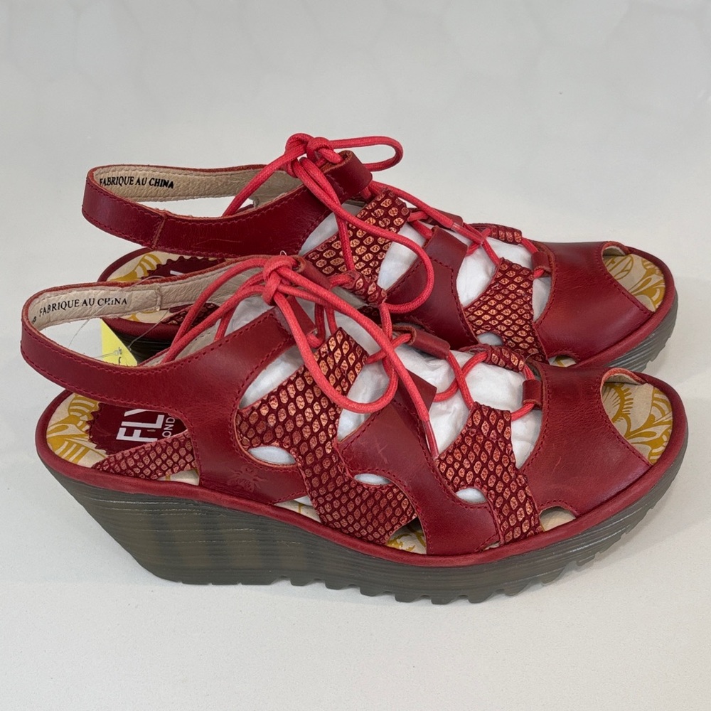 Fly London wedge sandals, often referred to as a lace-up open-toe. NEW IN THE BX
